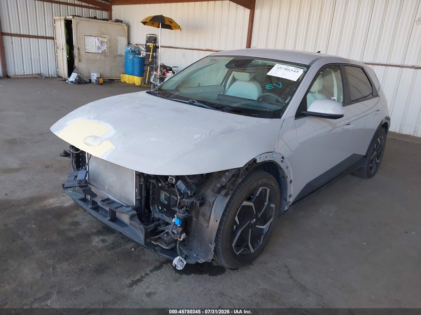 2022 Hyundai Ioniq 5 VIN KM8KNDAF8NU103652 IAAI salvage auction — FRONT & REAR, Salvage Title, sold $9,400 on 2026-08-14 (photo 2)