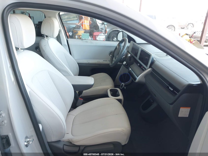 2022 Hyundai Ioniq 5 VIN KM8KNDAF8NU103652 IAAI salvage auction — FRONT & REAR, Salvage Title, sold $9,400 on 2026-08-14 (photo 5)