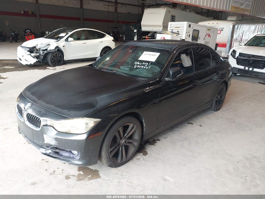 2014 BMW 3 series VIN WBA3A5G54ENP31837 IAAI salvage auction — NORMAL WEAR, Clear (Florida), sold $250 on 2026-08-12 (photo 2)