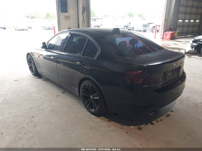 2014 BMW 3 series VIN WBA3A5G54ENP31837 IAAI salvage auction — NORMAL WEAR, Clear (Florida), sold $250 on 2026-08-12 (photo 3)