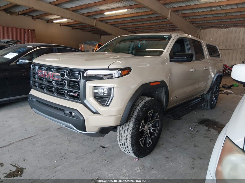 2023 Gmc Canyon VIN 1GTP6DEK4P1135193 IAAI salvage auction — SIDE, Salvage Title, sold $17,000 on 2026-08-23 (photo 2)
