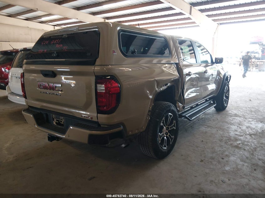 2023 Gmc Canyon VIN 1GTP6DEK4P1135193 IAAI salvage auction — SIDE, Salvage Title, sold $17,000 on 2026-08-23 (photo 4)