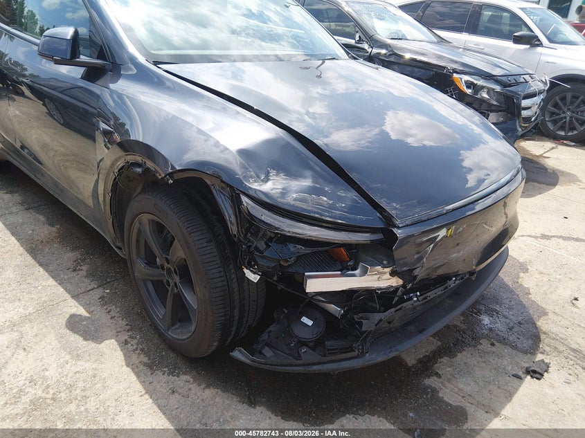 2026 Tesla Model y VIN 7SAYGDED9TA437485 IAAI salvage auction — RIGHT FRONT, Salvage (North Carolina), sold $23,550 on 2026-09-14 (photo 6)