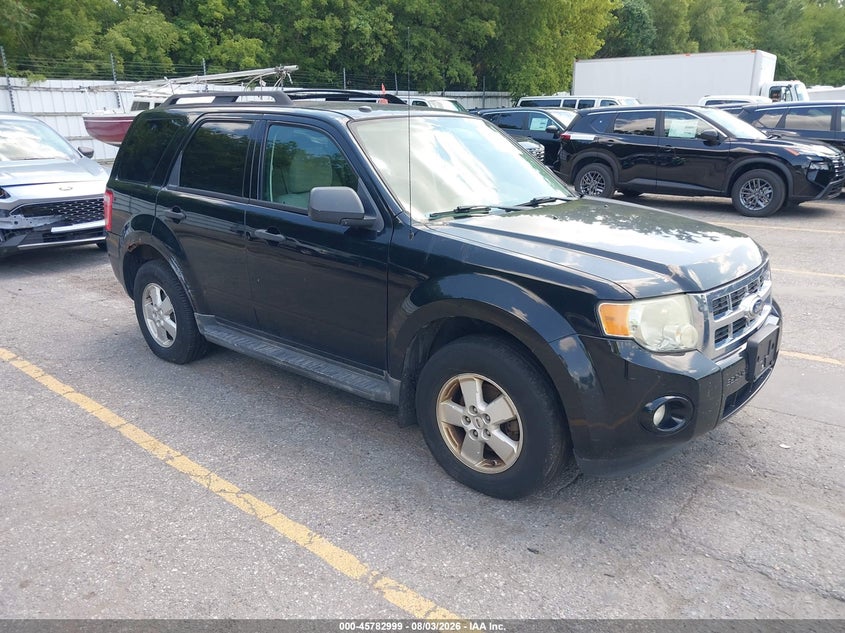 2010 Ford Escape VIN 1FMCU9DG8AKC97744 IAAI salvage auction — SIDE, Clear (Michigan), sold $25 on 2026-09-06 (photo 1)