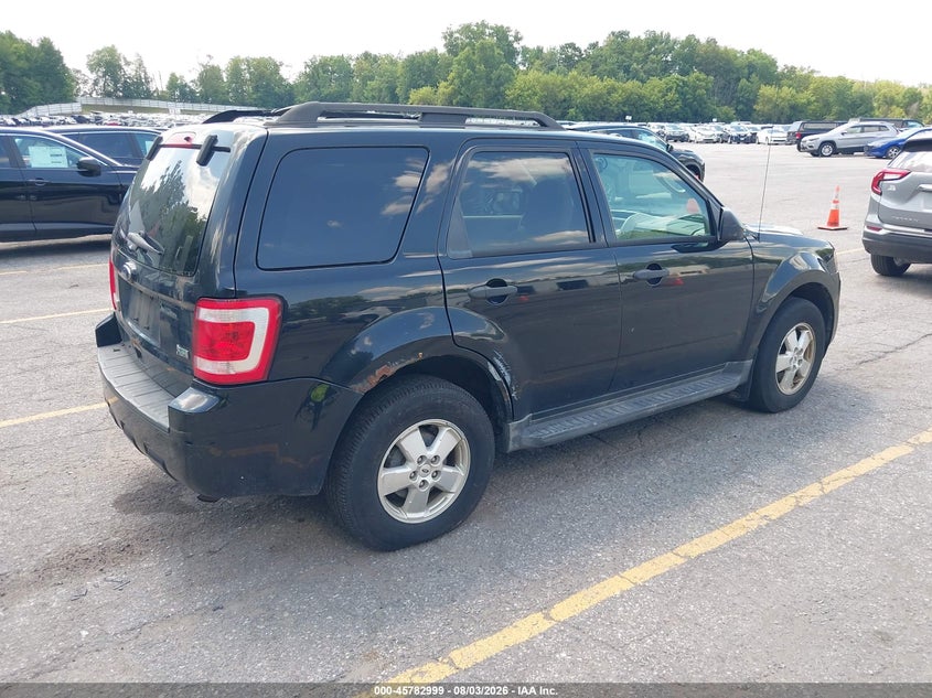 2010 Ford Escape VIN 1FMCU9DG8AKC97744 IAAI salvage auction — SIDE, Clear (Michigan), sold $25 on 2026-09-06 (photo 4)