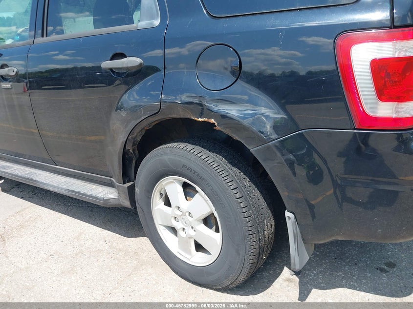 2010 Ford Escape VIN 1FMCU9DG8AKC97744 IAAI salvage auction — SIDE, Clear (Michigan), sold $25 on 2026-09-06 (photo 6)
