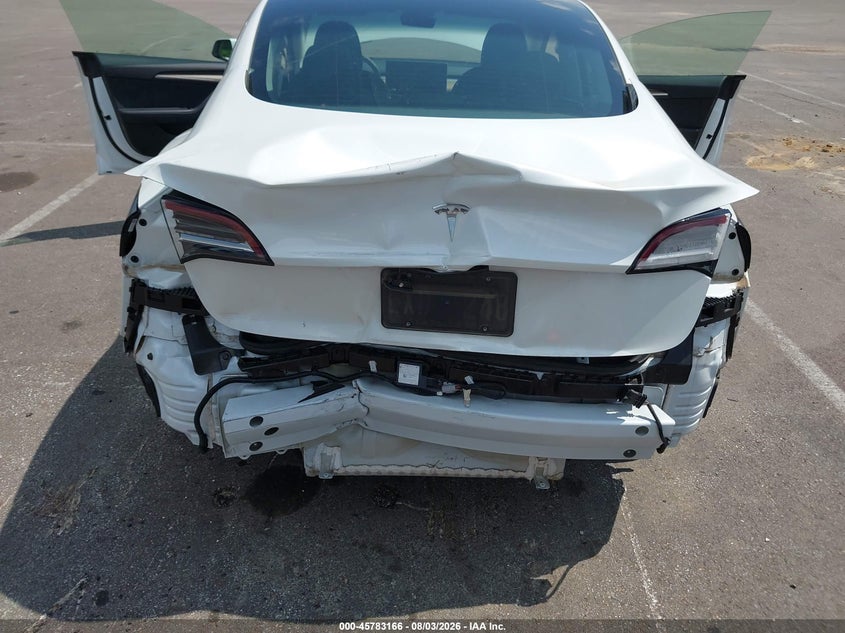 2023 Tesla Model 3 VIN 5YJ3E1EA2PF465249 IAAI salvage auction — REAR END, Salvage Title, sold $7,600 on 2026-09-15 (photo 6)