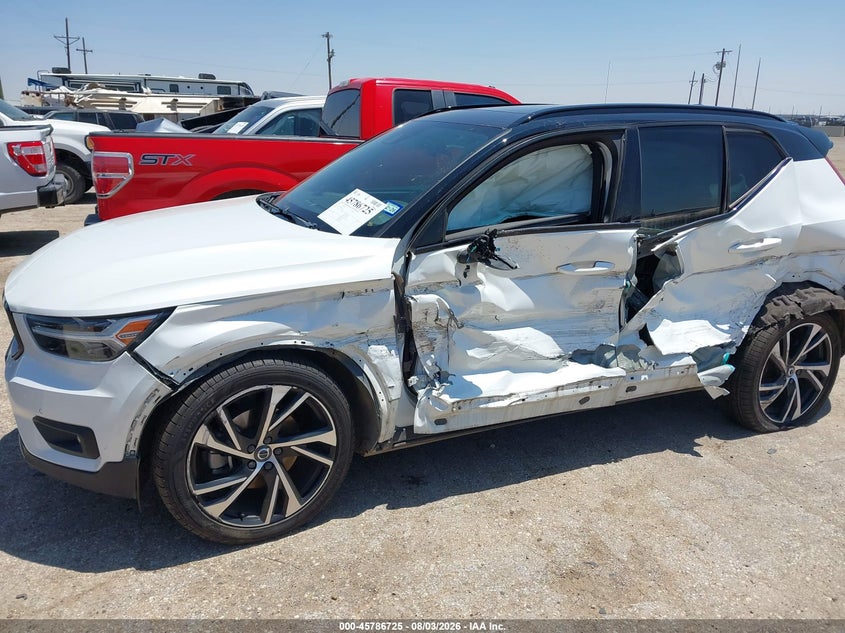2022 Volvo Xc40 VIN YV4AC2HM9N2700221 IAAI salvage auction — SIDE, Salvage Title, sold $4,250 on 2026-08-27 (photo 6)