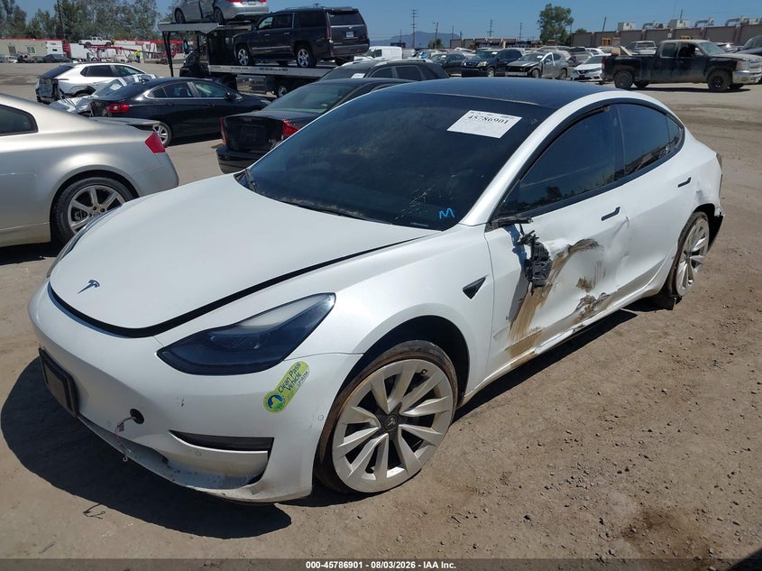 2022 Tesla Model 3 VIN 5YJ3E1EA0NF199159 IAAI salvage auction — SIDE, Salvage Title, sold $2,750 on 2026-09-26 (photo 2)
