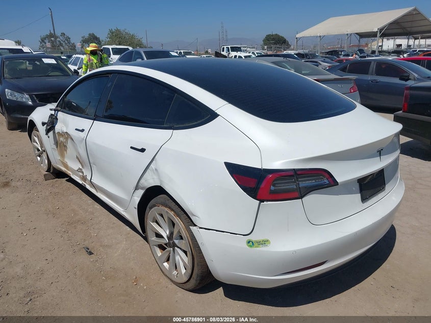 2022 Tesla Model 3 VIN 5YJ3E1EA0NF199159 IAAI salvage auction — SIDE, Salvage Title, sold $2,750 on 2026-09-26 (photo 3)