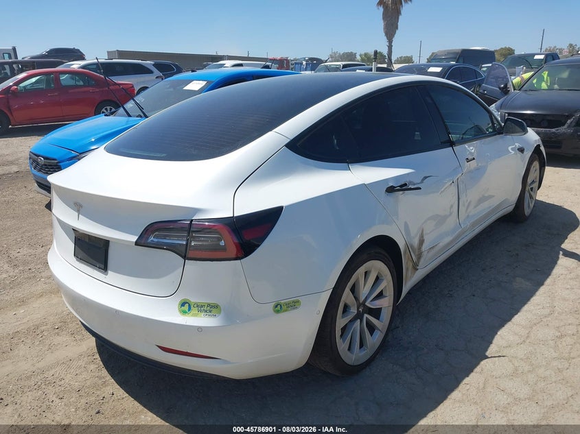 2022 Tesla Model 3 VIN 5YJ3E1EA0NF199159 IAAI salvage auction — SIDE, Salvage Title, sold $2,750 on 2026-09-26 (photo 4)