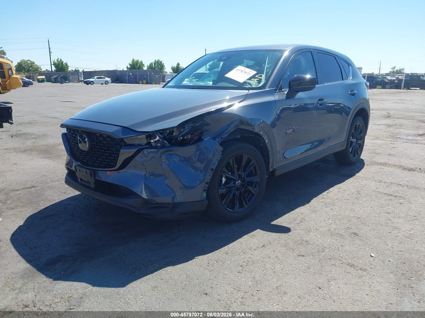 2023 Mazda Cx-5 VIN JM3KFBCM5P0208281 IAAI salvage auction — SIDE, Salvage Title, sold $7,600 on 2026-08-29 (photo 2)