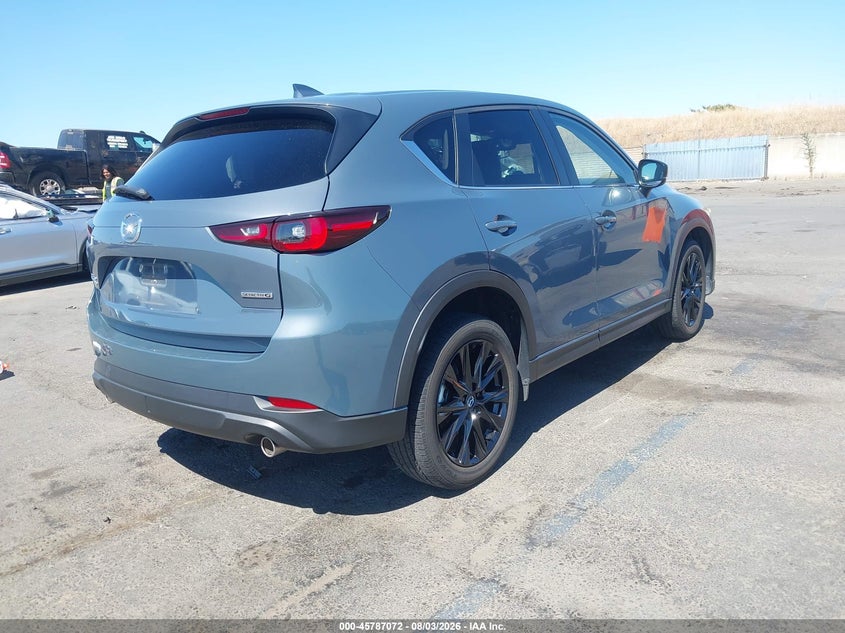 2023 Mazda Cx-5 VIN JM3KFBCM5P0208281 IAAI salvage auction — SIDE, Salvage Title, sold $7,600 on 2026-08-29 (photo 4)
