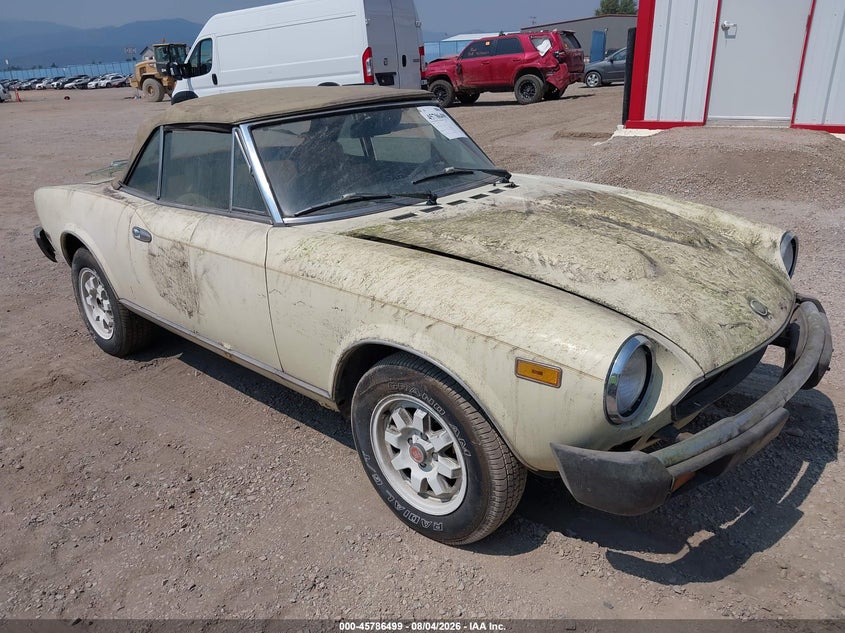 1982 Fiat 124 spider VIN ZFAAS00B1C8189190 IAAI salvage auction — NORMAL WEAR, Clear (Montana), sold $875 on 2026-08-12 (photo 1)
