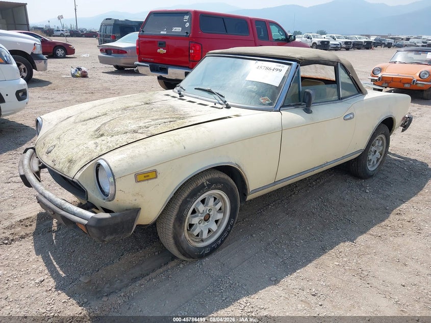 1982 Fiat 124 spider VIN ZFAAS00B1C8189190 IAAI salvage auction — NORMAL WEAR, Clear (Montana), sold $875 on 2026-08-12 (photo 2)