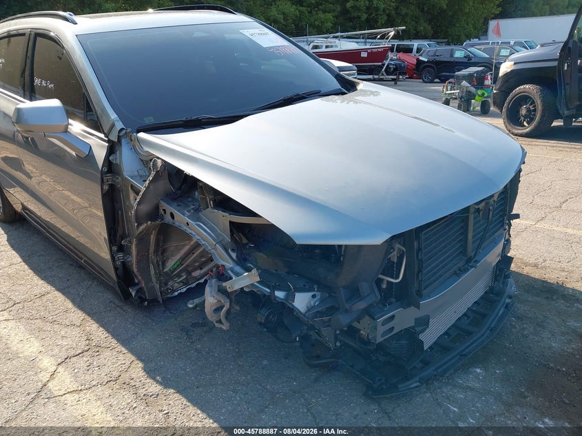 2025 Cadillac Xt4 VIN 1GYFZFR49SF143015 IAAI salvage auction — RIGHT FRONT, Salvage Title, sold $9,400 on 2026-09-14 (photo 6)