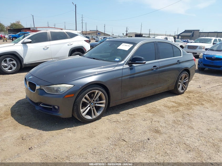 2013 BMW 3er VIN WBA3F9C55DF483900 IAAI salvage auction — NORMAL WEAR, Original (Texas), sold $2,150 on 2026-08-19 (photo 2)