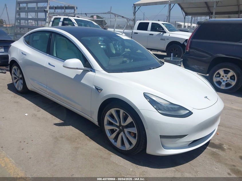 2019 Tesla Model 3 VIN 5YJ3E1EB9KF407009 — IAAI salvage auction photo