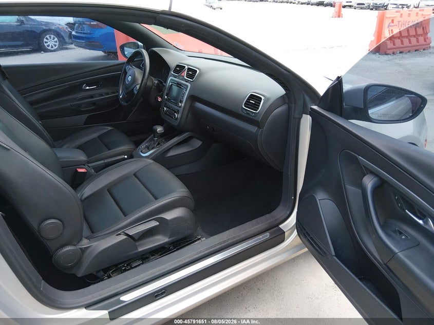 2010 Volkswagen Eos VIN WVWBA7AH7AV021371 IAAI salvage auction — NORMAL WEAR, Original (Texas), sold $1,100 on 2026-08-17 (photo 5)