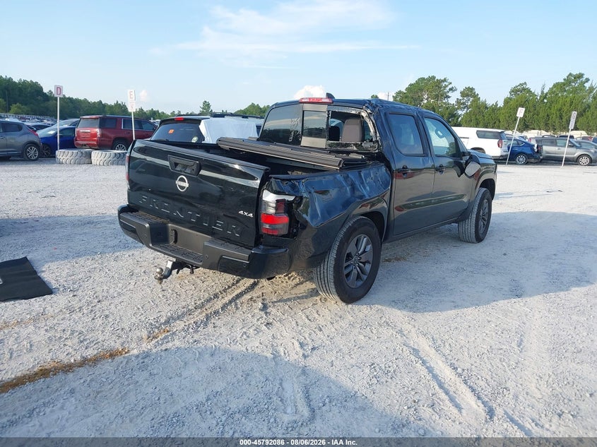 2026 Nissan Frontier VIN 1N6ED1EK5TN628117 IAAI salvage auction — ROLLOVER, Clear (Florida), sold $8,575 on 2026-08-13 (photo 4)