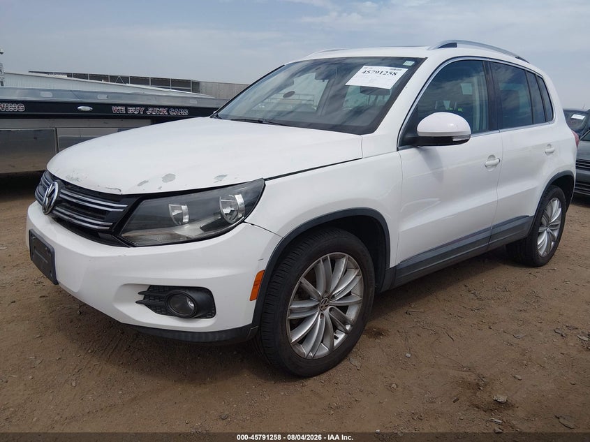2013 Volkswagen Tiguan VIN WVGAV7AX6DW551011 IAAI salvage auction — NORMAL WEAR, Salvage Title, sold $275 on 2026-08-11 (photo 2)