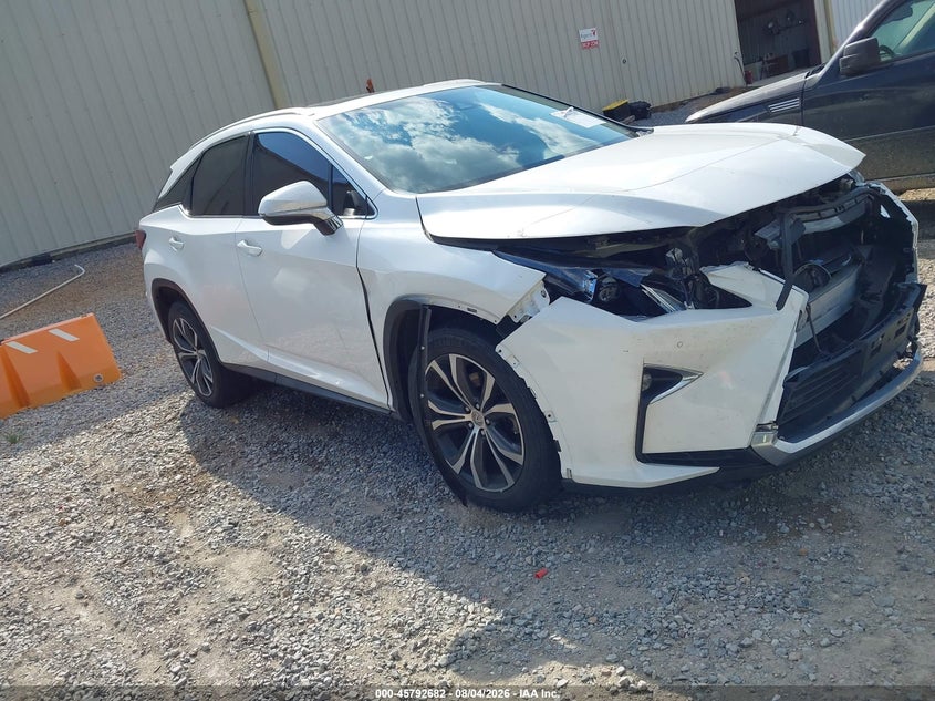 2016 Lexus Rx VIN 2T2BZMCA2GC007327 IAAI salvage auction — SIDE, Salvage Title, sold $9,950 on 2026-09-04 (photo 1)