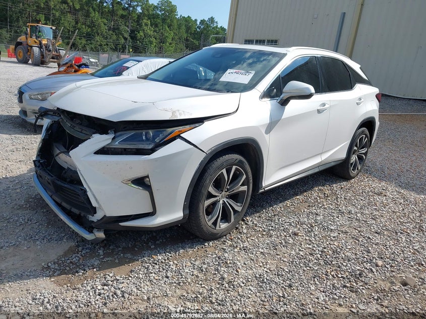 2016 Lexus Rx VIN 2T2BZMCA2GC007327 IAAI salvage auction — SIDE, Salvage Title, sold $9,950 on 2026-09-04 (photo 2)