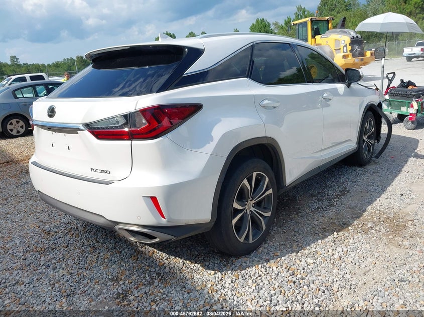 2016 Lexus Rx VIN 2T2BZMCA2GC007327 IAAI salvage auction — SIDE, Salvage Title, sold $9,950 on 2026-09-04 (photo 4)