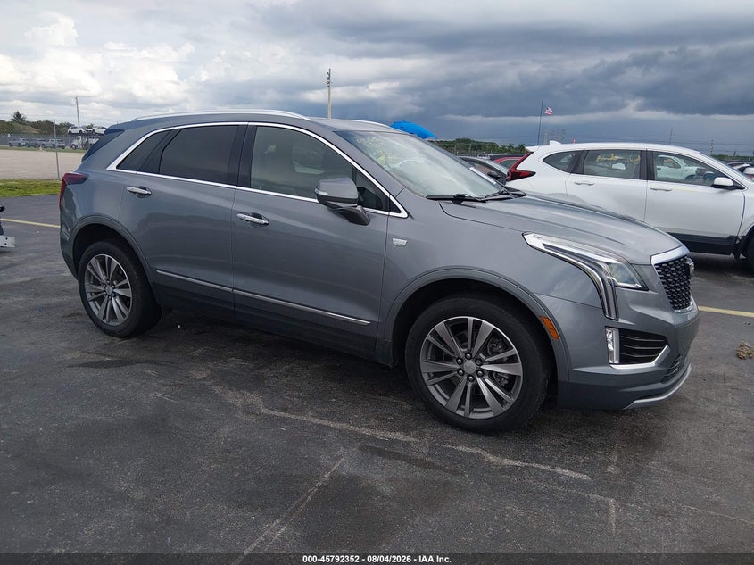 2021 Cadillac Xt5 VIN 1GYKNCRS7MZ117585 IAAI salvage auction — LEFT SIDE, Wait Title, sold $6,000 on 2026-10-11 (photo 1)