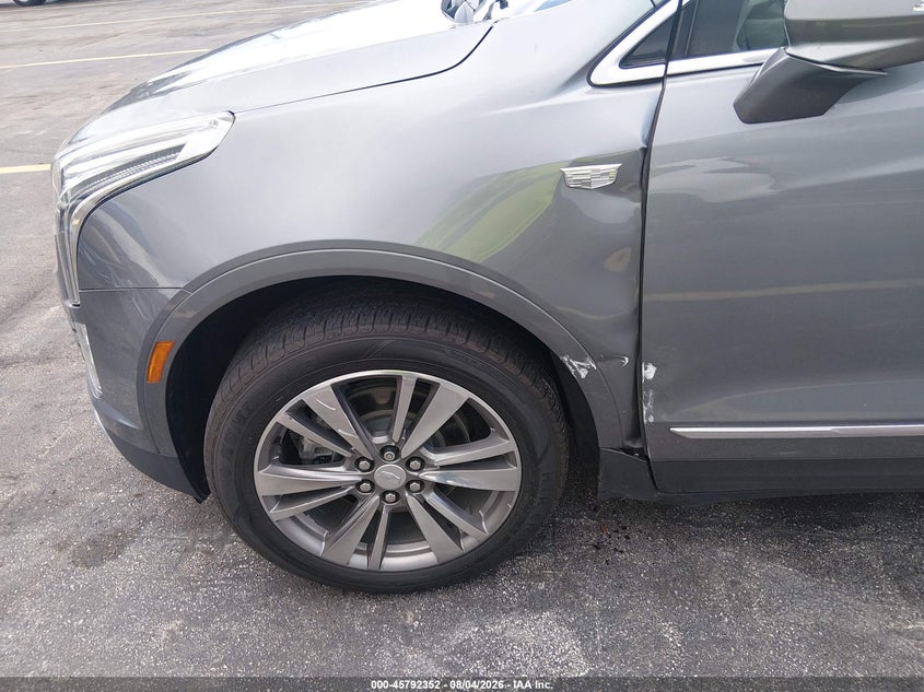 2021 Cadillac Xt5 VIN 1GYKNCRS7MZ117585 IAAI salvage auction — LEFT SIDE, Wait Title, sold $6,000 on 2026-10-11 (photo 6)