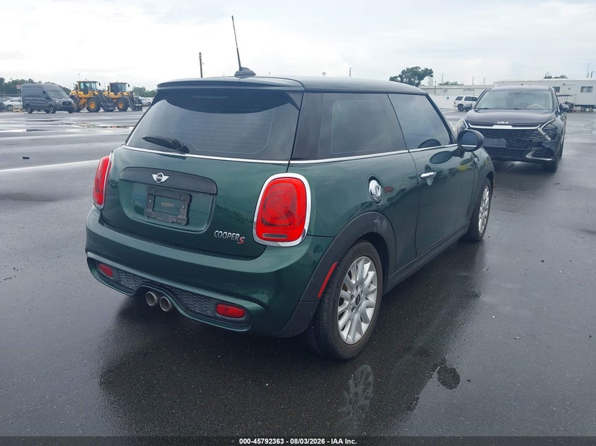 2015 Mini Hard top VIN WMWXP7C54F2A38693 IAAI salvage auction — WATER/FLOOD, Salvage Title, sold $2,000 on 2026-09-03 (photo 4)