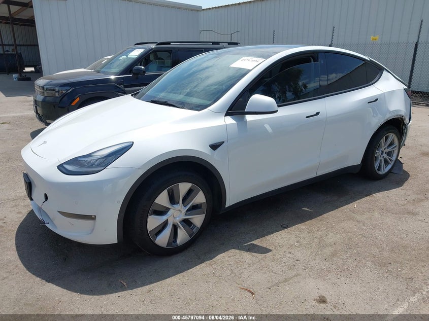 2021 Tesla Model y VIN 5YJYGAEEXMF243752 IAAI salvage auction — REAR END, Wait Title, sold $8,300 on 2026-09-06 (photo 2)
