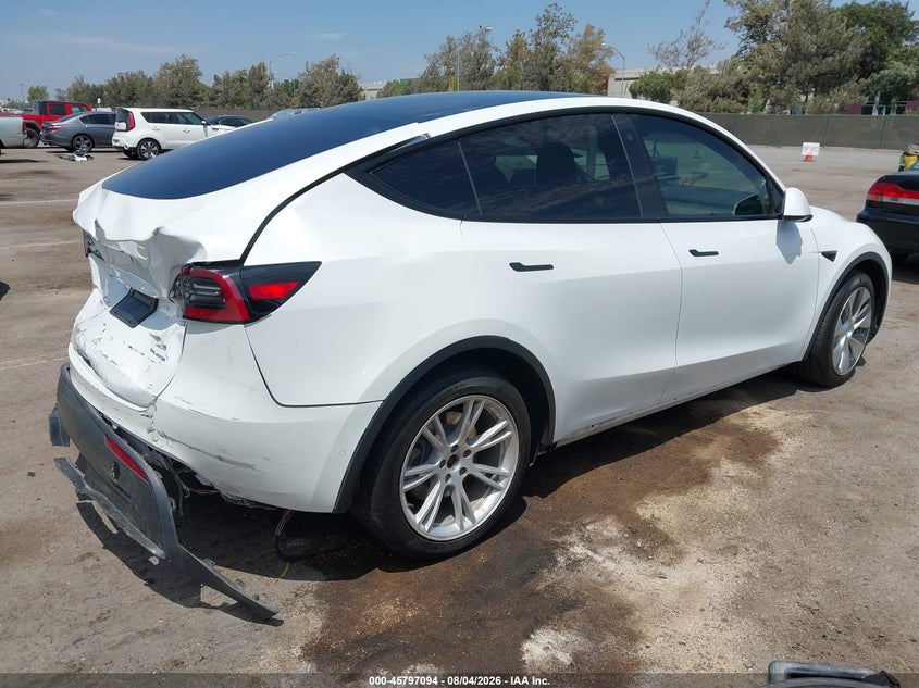2021 Tesla Model y VIN 5YJYGAEEXMF243752 IAAI salvage auction — REAR END, Wait Title, sold $8,300 on 2026-09-06 (photo 4)