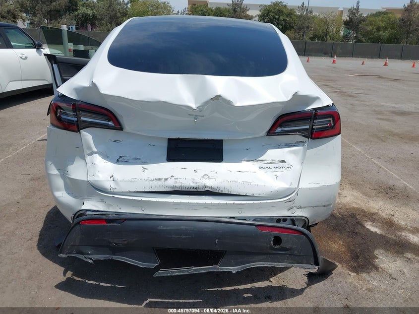 2021 Tesla Model y VIN 5YJYGAEEXMF243752 IAAI salvage auction — REAR END, Wait Title, sold $8,300 on 2026-09-06 (photo 6)