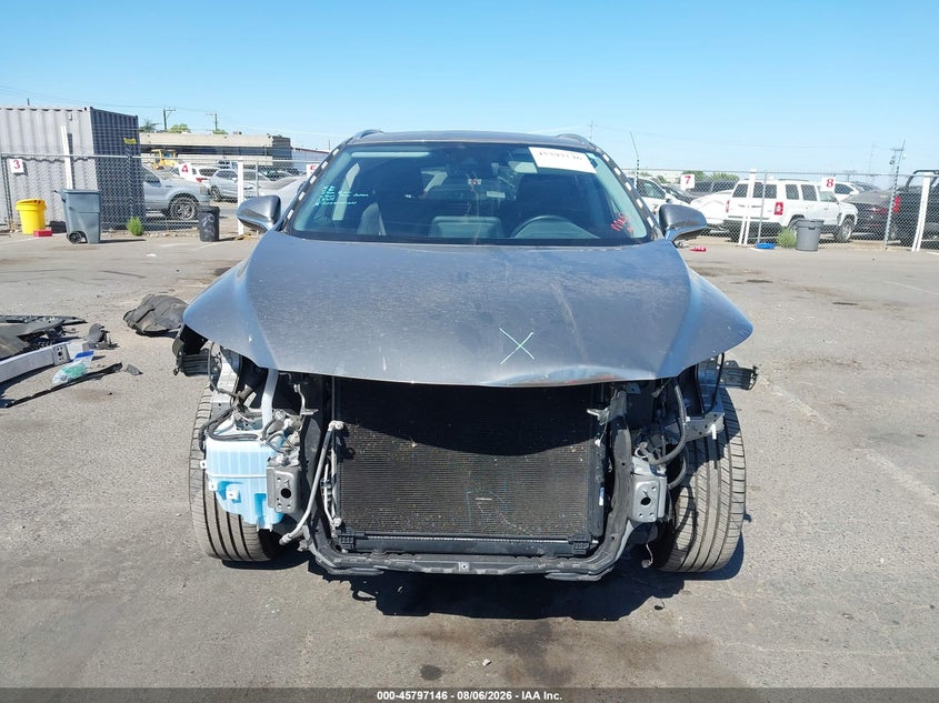 2021 Lexus Rx VIN 2T2HZMAAXMC219093 IAAI salvage auction — FRONT END, Wait Title, sold $15,950 on 2026-08-26 (photo 6)