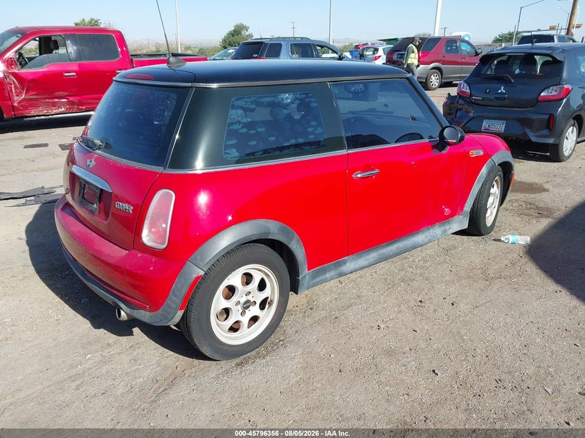 2005 Mini Cooper VIN WMWRC33545TK61724 IAAI salvage auction — NORMAL WEAR, Clear (New Mexico), sold $225 on 2026-08-10 (photo 4)