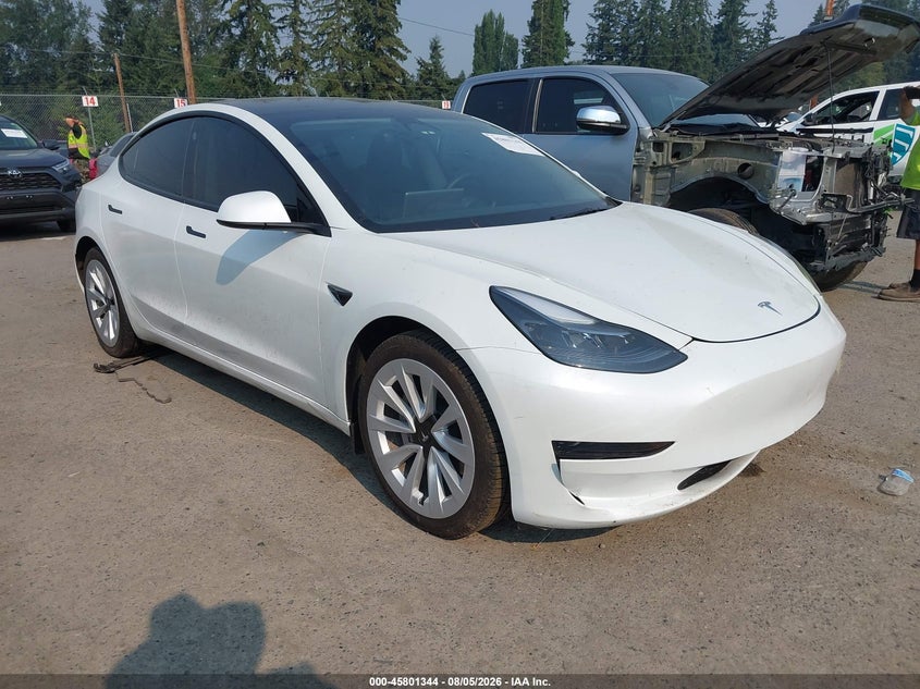 2023 Tesla Model 3 VIN 5YJ3E1EA1PF608854 IAAI salvage auction — LEFT SIDE, Wait Title, sold $7,100 on 2026-08-22 (photo 1)