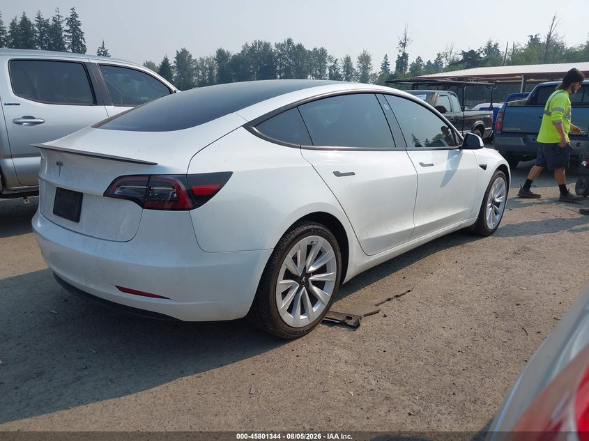 2023 Tesla Model 3 VIN 5YJ3E1EA1PF608854 IAAI salvage auction — LEFT SIDE, Wait Title, sold $7,100 on 2026-08-22 (photo 4)