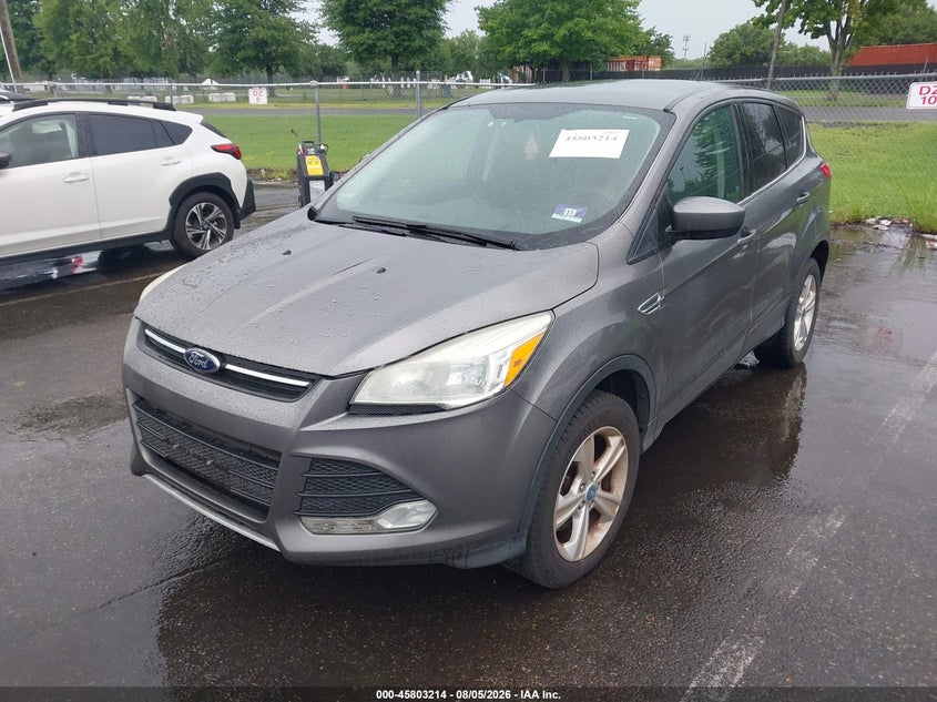 2013 Ford Escape VIN 1FMCU9GX0DUB35580 IAAI salvage auction — SIDE, Clear (New Jersey), sold $525 on 2026-09-06 (photo 2)
