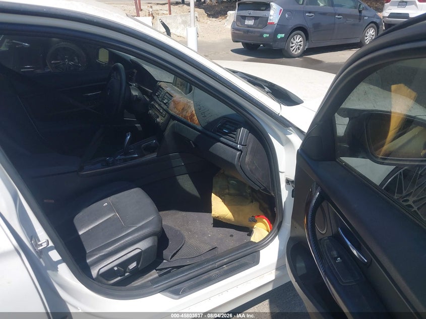 2014 BMW 3er VIN WBA3C1C52EK110753 IAAI salvage auction — NORMAL WEAR, Salvage (California), sold $425 on 2026-08-11 (photo 5)