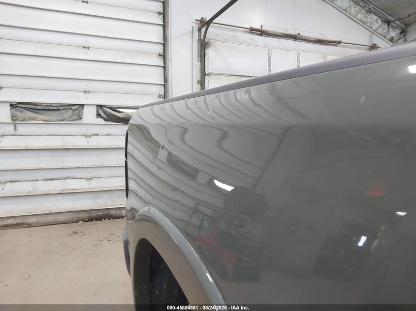 2026 Ram 1500 VIN 1C6SRFFT9TN253531 IAAI salvage auction — HAIL, Salvage Title, sold $31,000 on 2026-09-26 (photo 6)