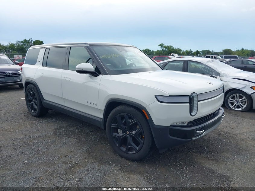 2024 Rivian R1s VIN 7PDSGBBA9RN037210 IAAI salvage auction — LEFT SIDE, Salvage Title, sold $17,975 on 2026-09-01 (photo 1)