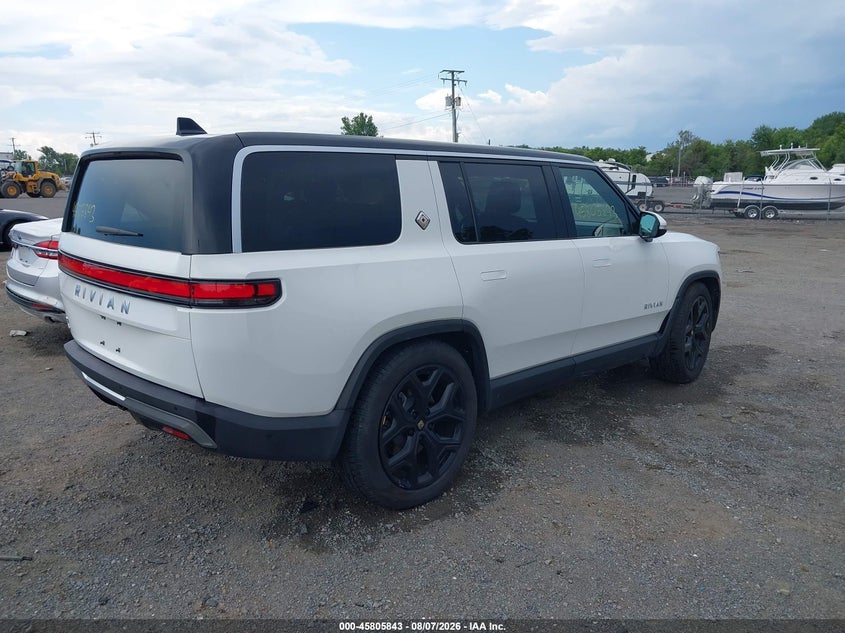 2024 Rivian R1s VIN 7PDSGBBA9RN037210 IAAI salvage auction — LEFT SIDE, Salvage Title, sold $17,975 on 2026-09-01 (photo 4)