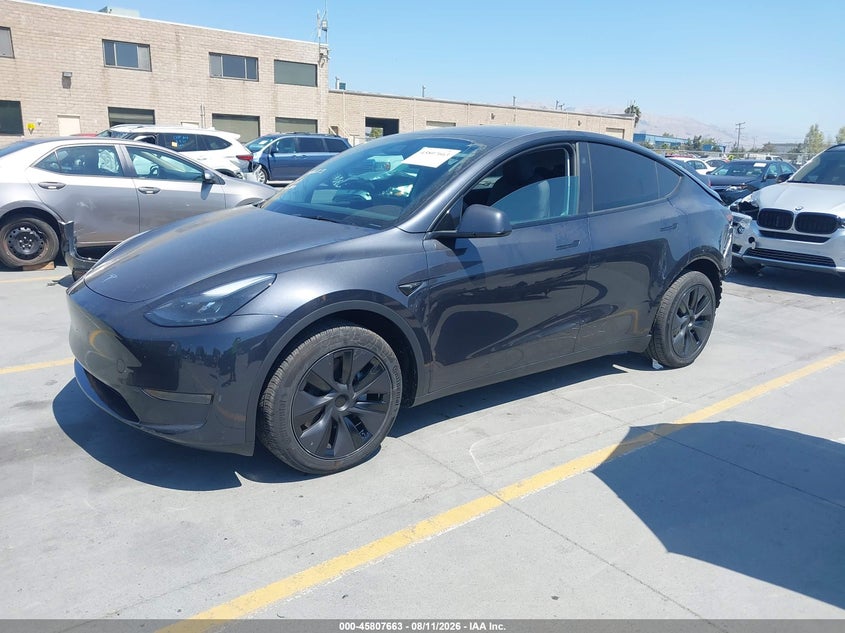 2025 Tesla Model y VIN 7SAYGDED5SF314090 IAAI salvage auction — REAR END, Salvage Title, sold $16,450 on 2026-09-14 (photo 2)