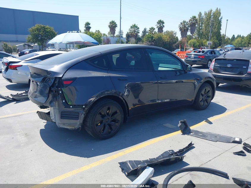 2025 Tesla Model y VIN 7SAYGDED5SF314090 IAAI salvage auction — REAR END, Salvage Title, sold $16,450 on 2026-09-14 (photo 4)