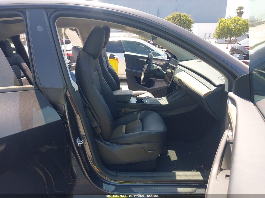 2025 Tesla Model y VIN 7SAYGDED5SF314090 IAAI salvage auction — REAR END, Salvage Title, sold $16,450 on 2026-09-14 (photo 5)