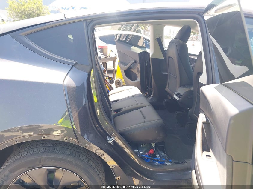 2025 Tesla Model y VIN 7SAYGDED5SF314090 IAAI salvage auction — REAR END, Salvage Title, sold $16,450 on 2026-09-14 (photo 8)