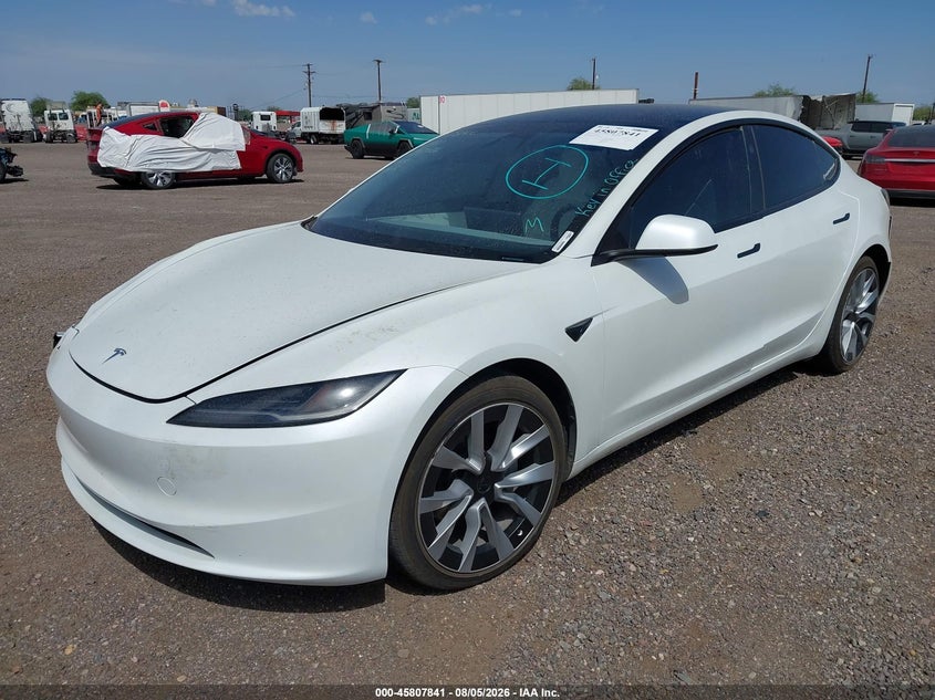 2025 Tesla Model 3 VIN 5YJ3E1EA7SF048184 IAAI salvage auction — RIGHT FRONT, Wait Title, sold $14,100 on 2026-09-05 (photo 2)