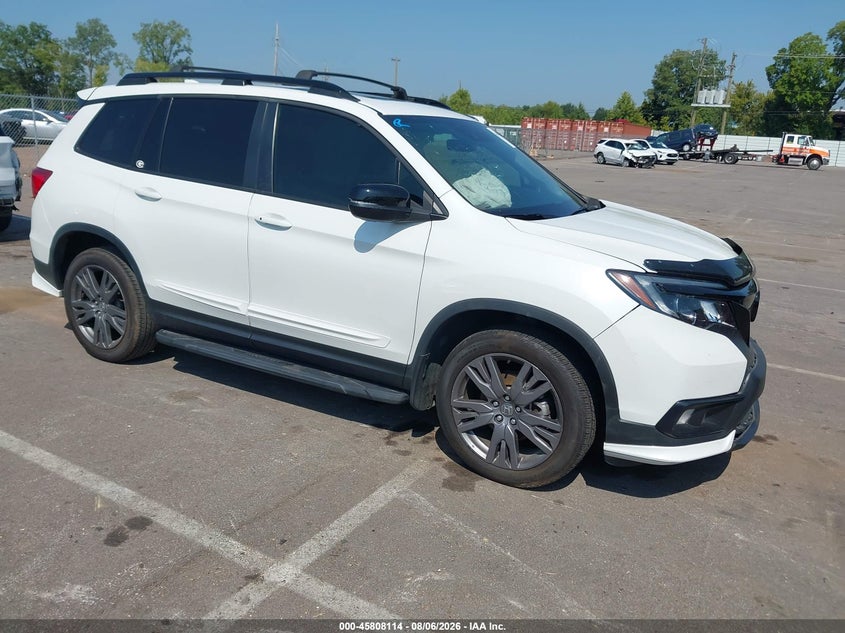 2020 Honda Passport VIN 5FNYF8H51LB013300 — IAAI salvage auction photo