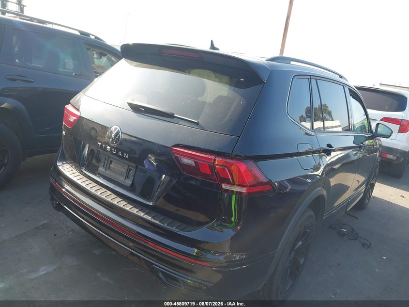 2023 Volkswagen Tiguan VIN 3VVCB7AX6PM140977 IAAI salvage auction — RIGHT FRONT, Salvage Title, sold $4,950 on 2026-09-19 (photo 4)